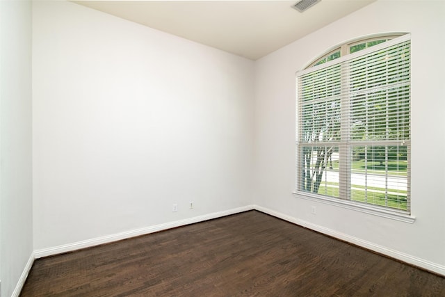 empty room featuring hardwood / wood-style flooring