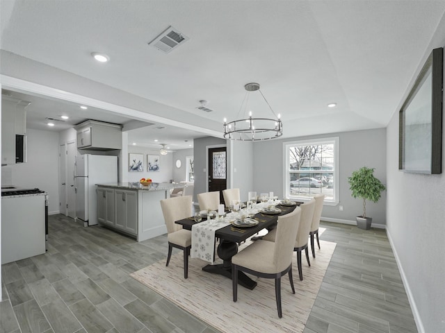 dining room featuring a chandelier