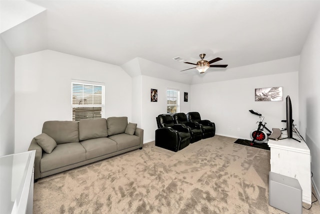 carpeted living room featuring lofted ceiling and ceiling fan