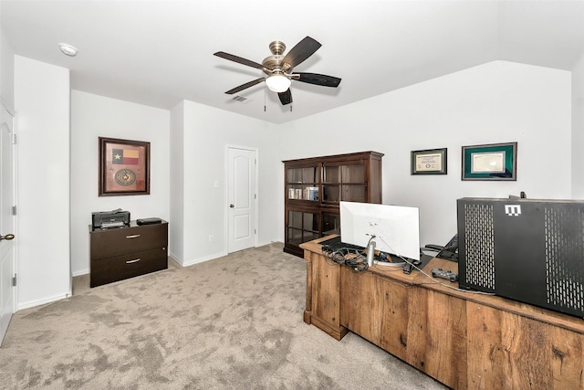 office space featuring ceiling fan, light colored carpet, and lofted ceiling