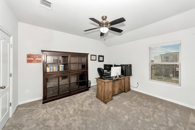 carpeted office featuring vaulted ceiling and ceiling fan