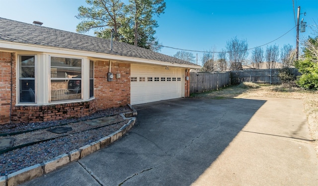 view of side of property featuring a garage