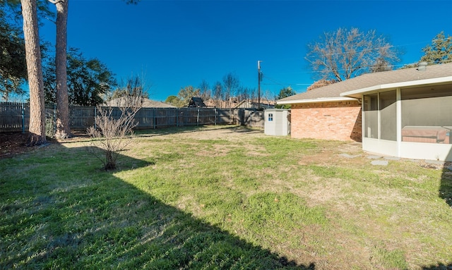 view of yard with a sunroom