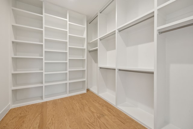 410 Kirkwood Dr, Dallas, TX 75218 - spacious closet with light wood-style floors