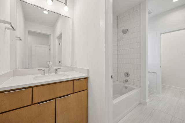 full bath with shower / bathing tub combination, recessed lighting, vanity, and baseboards