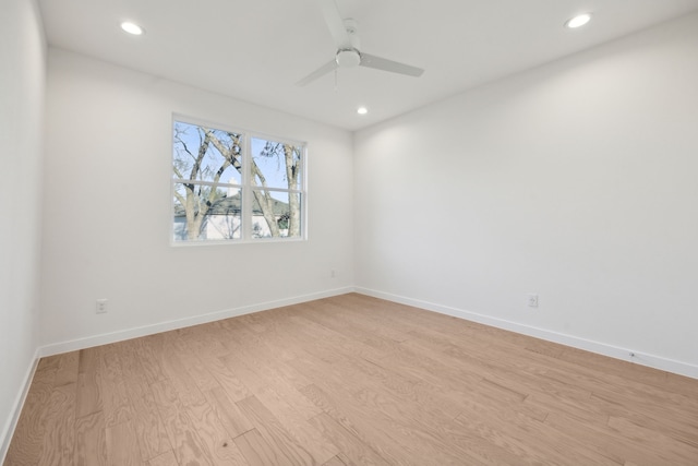 unfurnished room featuring light wood-type flooring, ceiling fan, baseboards, and recessed lighting