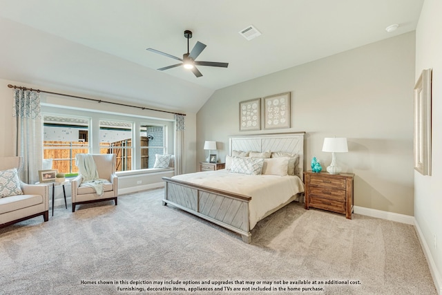 bedroom with ceiling fan, light colored carpet, and lofted ceiling