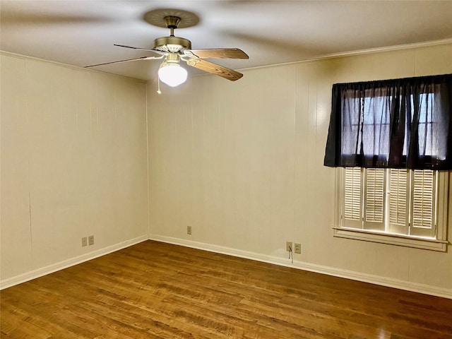 unfurnished room with ceiling fan, hardwood / wood-style floors, and ornamental molding