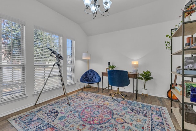 living area with vaulted ceiling, an inviting chandelier, and dark hardwood / wood-style flooring