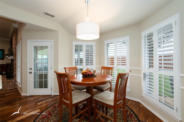 dining area featuring dark hardwood / wood-style flooring