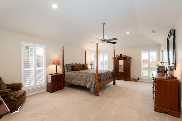 bedroom with light carpet, lofted ceiling, and ceiling fan