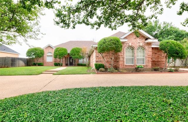 view of front of property with a front lawn