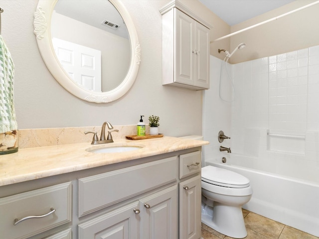 full bathroom featuring bathtub / shower combination, toilet, tile patterned floors, and vanity