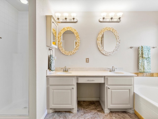 bathroom featuring vanity and independent shower and bath