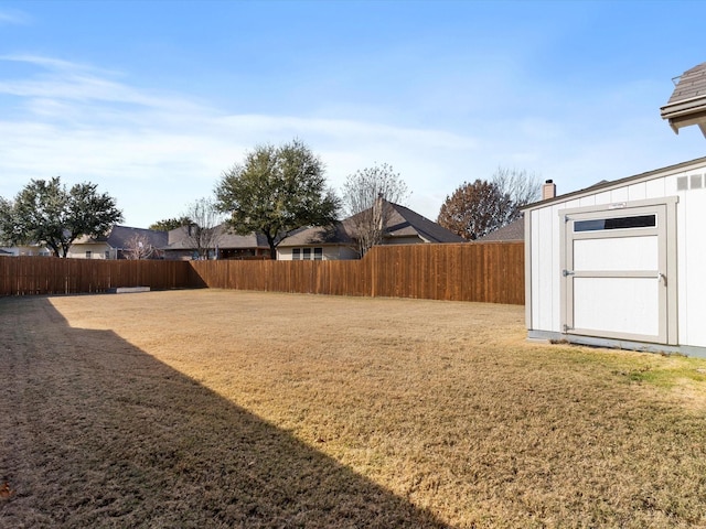 view of yard with a storage shed