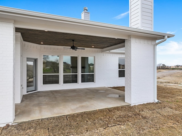 view of patio / terrace featuring ceiling fan