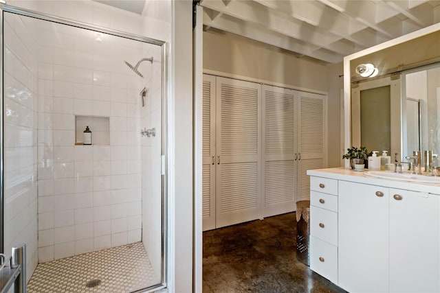 bathroom featuring vanity, concrete floors, and a shower with shower door