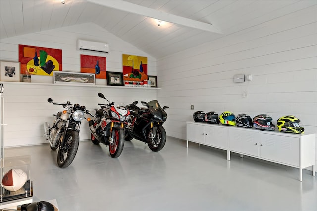 garage with wood ceiling, wooden walls, and a wall mounted AC