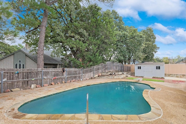 view of pool with a storage unit