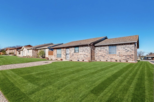 view of front of house with a front lawn