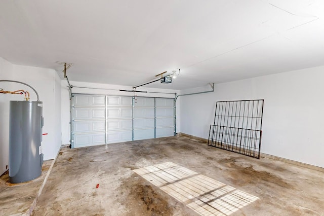 garage with a garage door opener and electric water heater