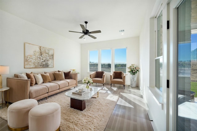 living room with ceiling fan