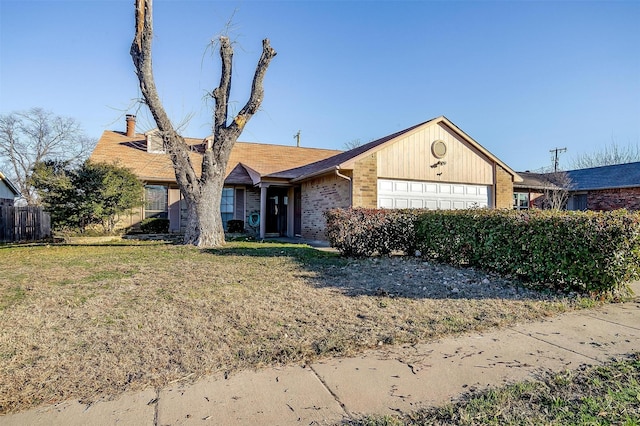 ranch-style home featuring a front yard and a garage