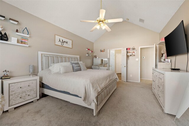 carpeted bedroom with lofted ceiling, a textured ceiling, and ceiling fan