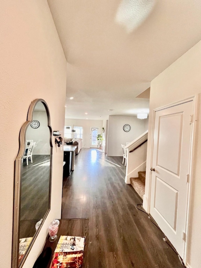 hallway featuring dark hardwood / wood-style floors