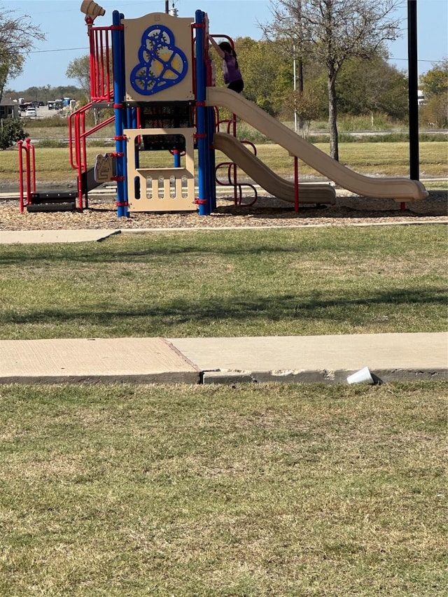 view of play area featuring a yard