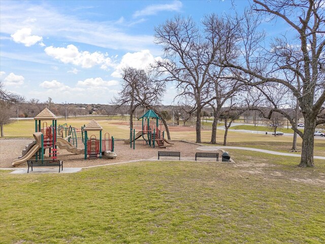 view of play area featuring a lawn