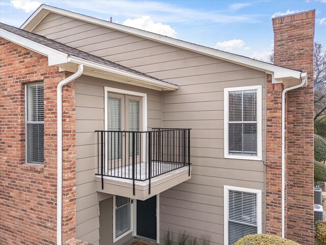 view of property exterior with a balcony