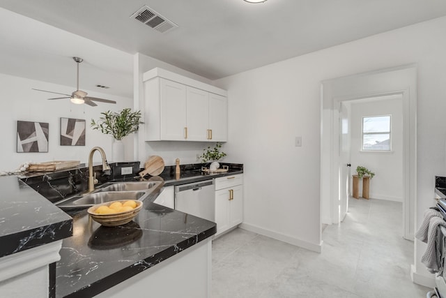 kitchen featuring dishwasher, white cabinetry, stove, sink, and ceiling fan