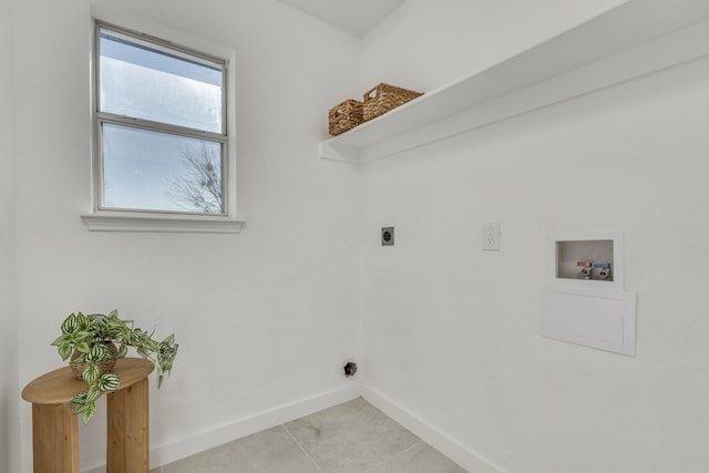 laundry room featuring washer hookup, light tile patterned floors, and electric dryer hookup