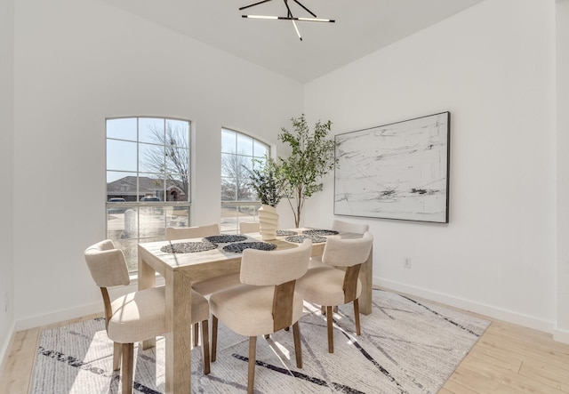 dining area featuring light wood-type flooring