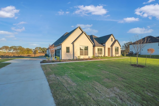 view of front of property with a front lawn