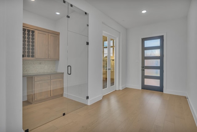 entryway with light wood-type flooring