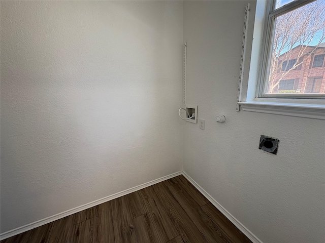 laundry room featuring laundry area, baseboards, dark wood finished floors, hookup for a washing machine, and electric dryer hookup