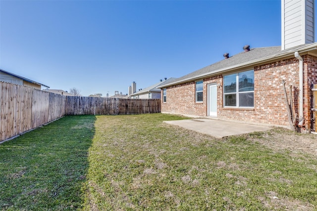 view of yard featuring a fenced backyard and a patio