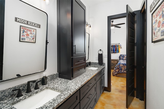 bathroom featuring ceiling fan and vanity