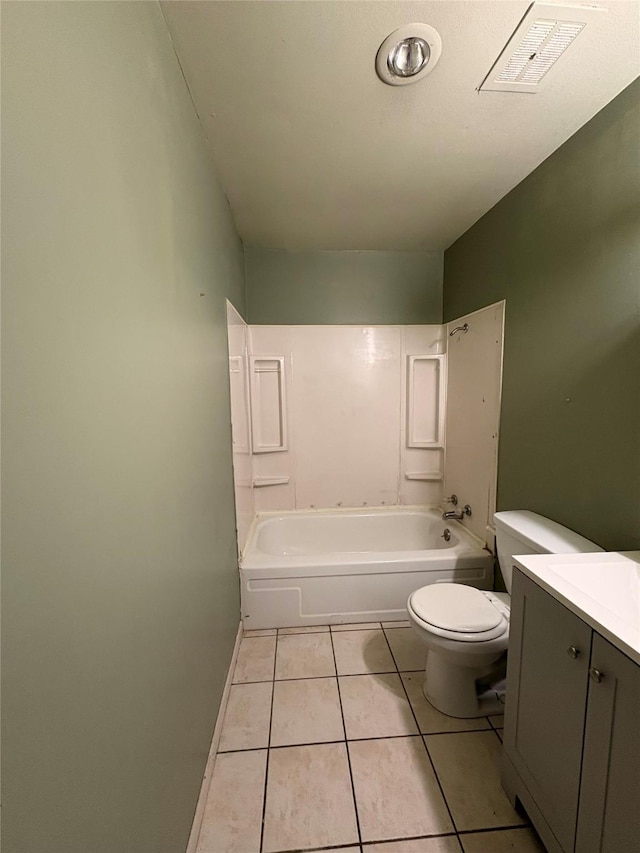 full bathroom with  shower combination, tile patterned floors, vanity, and toilet