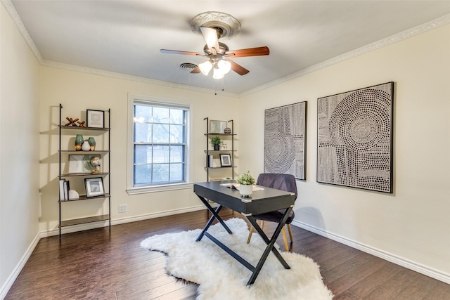 office with ornamental molding, dark wood-type flooring, and ceiling fan