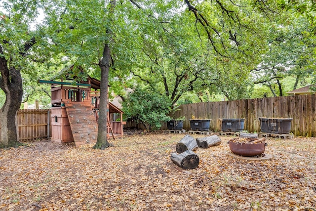 view of yard featuring a playground