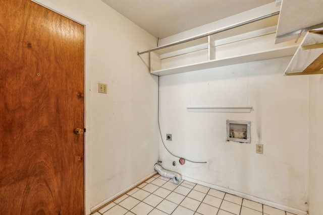 laundry room featuring hookup for a washing machine, light tile patterned floors, and hookup for an electric dryer