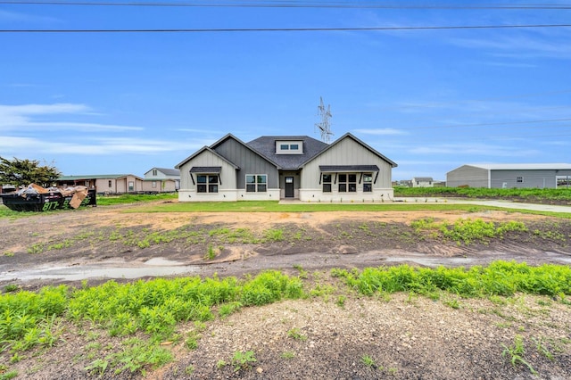 modern farmhouse featuring board and batten siding