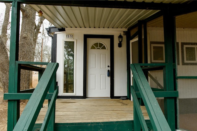 entrance to property with a deck