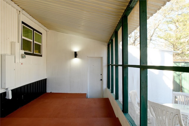 hall with lofted ceiling