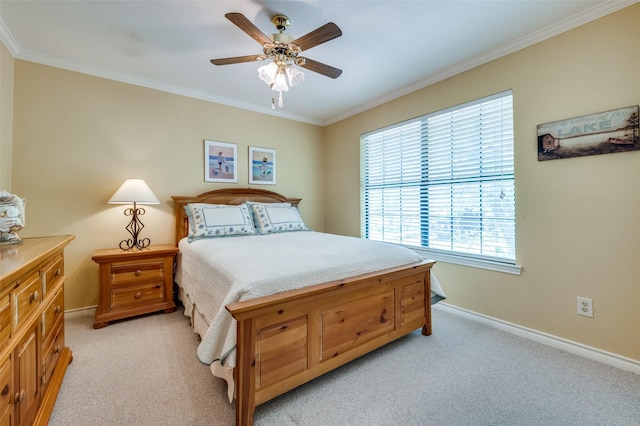 carpeted bedroom featuring crown molding, multiple windows, and ceiling fan