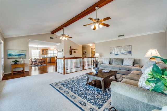 living room with vaulted ceiling with beams, carpet floors, and crown molding