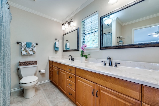 bathroom with vanity, toilet, ornamental molding, and tile patterned flooring